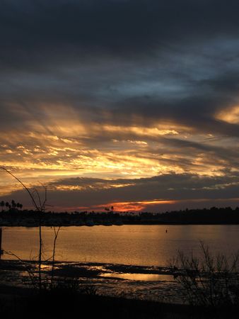 Colorful sunset in vertical view of Newport backbay Californiaの写真素材