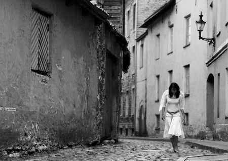 lonely angel walking on the streets of Old Cityの写真素材