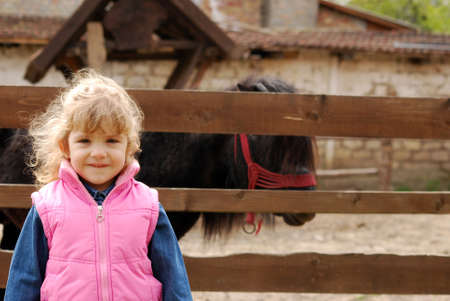 little girl on the farmの写真素材