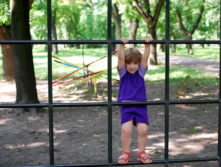 little girl in park playgroundの写真素材