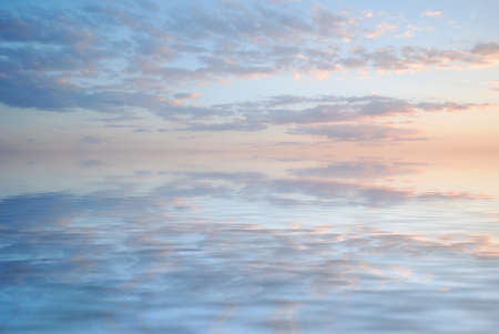 sky reflection in water backgroundの写真素材