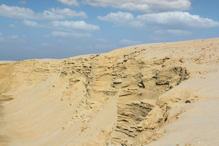 desert with sandy hills and blue skyの写真素材