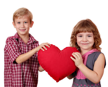 boy and little girl holding big red heartの写真素材