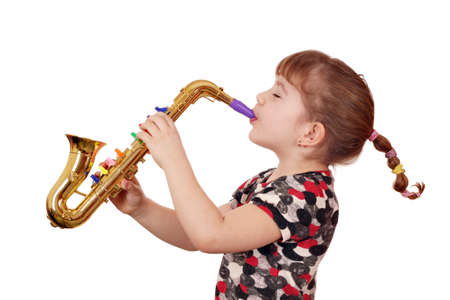 little girl play saxophoneの写真素材