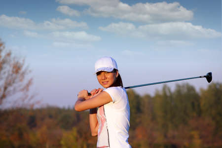 beautiful girl play golfの写真素材