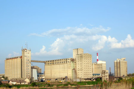 industry zone with silo and warehouseの写真素材