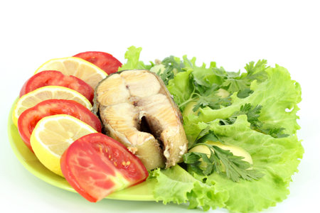 salmon with vegetables and saladの写真素材