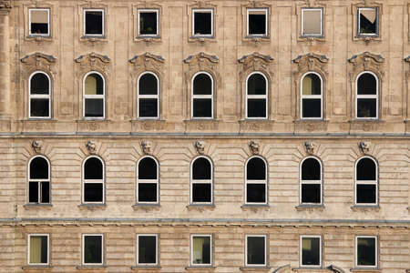 old building wall with windowsの写真素材
