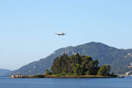 airplane flying over Mouse island Corfu Greece