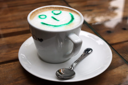 capuccino coffee with smileyの写真素材