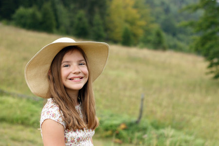 beautiful little girl outdoor portraitの写真素材