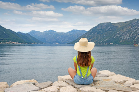 the girl enjoys a summer holiday Kotor bay Montenegro