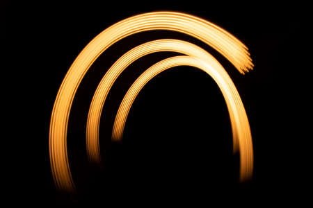 Golden gate.Abstract line from LED light.On the black background..の写真素材