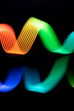 Light Painting Lines of Colour with reflection..LED lighting design style,night lights, drawing with LED lights,Storm of Lightの写真素材