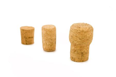 Three corks isolated on the white background.の写真素材