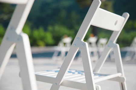 In North America or Europe, there are many outdoor weddings, and weddings are parties. This photo was taken emotionally with outdoor wedding chairsの写真素材