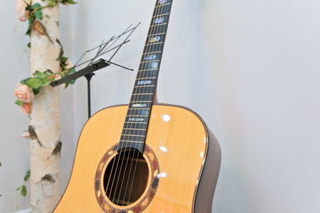 Small music stage with Spanish guitar and flower decorationの写真素材