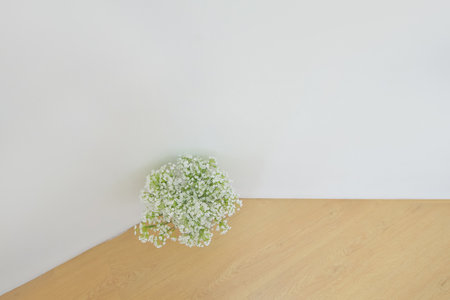 A photo of flowers placed in the living room that would suit an emotional accommodationの写真素材