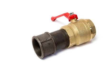 Ball valve connected to a pipe on white backgroundの写真素材