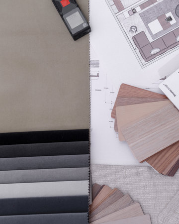 Different tone of dark colors. Project by female interior designer. Meter, papers, material, textile and cards on the table. Bird perspective.の写真素材