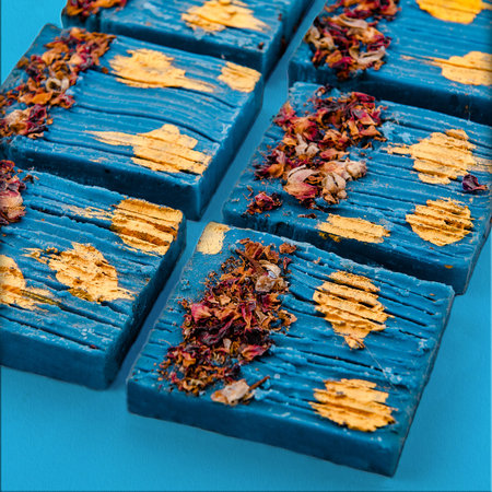 Creative tropical concept made of organic natural soap bars  on blue background.の写真素材