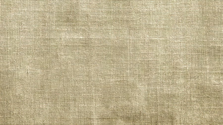 A soft and textured beige linen background perfect for various design projects, adding warmth and elegance to presentations, crafts, and photography.の素材