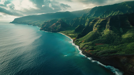 Discover a stunning aerial view of a lush coastline where dramatic mountains meet vibrant ocean waves under a dynamic sky, offering a serene escape.の素材