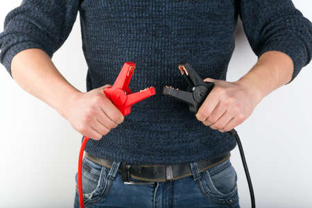 start jumper cable in the handsの写真素材