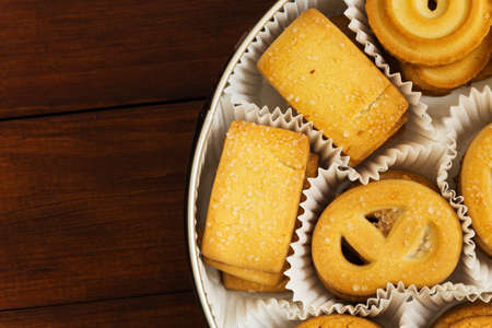 Set of fresh cookies in a beautiful curly packagingの写真素材