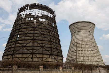 Two thermal towers of a power station against the skyの写真素材