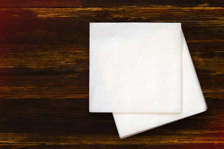 Napkin on wooden background.の写真素材