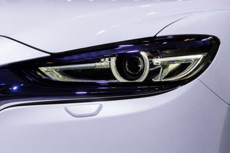 stylish modern car headlight close upの写真素材