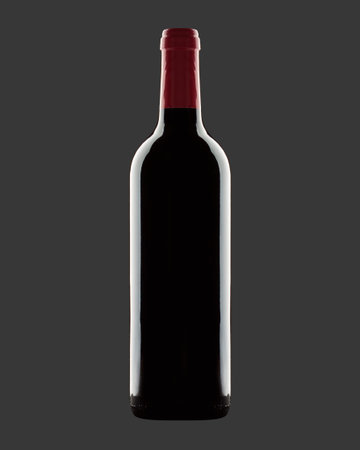 Frontal view of a red wine bottleの写真素材