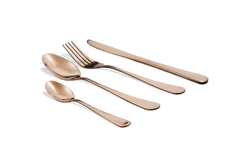 set or golden cutlery isolated on whiteの写真素材