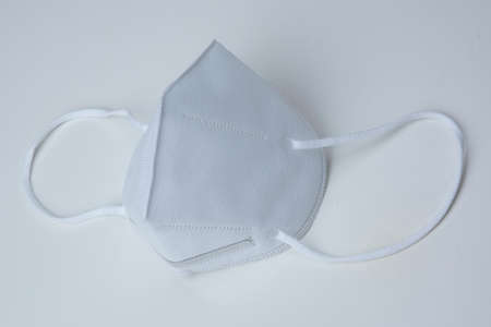 KN95 face mask protection against pm 2.5 contamination and COVID-19 coronavirus. Healthcare and medical conceptの写真素材