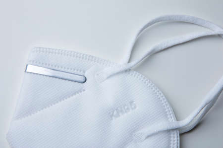 KN95 face mask protection against pm 2.5 contamination and COVID-19 coronavirus. Healthcare and medical conceptの写真素材