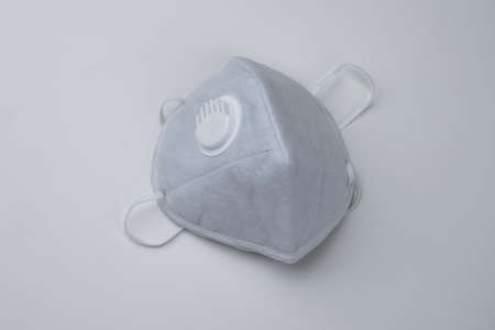 KN95 face mask protection against pm 2.5 contamination and COVID-19 coronavirus. Healthcare and medical conceptの写真素材