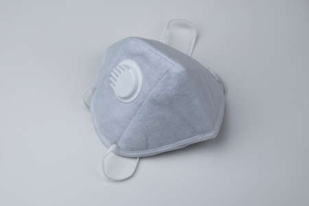KN95 face mask protection against pm 2.5 contamination and COVID-19 coronavirus. Healthcare and medical conceptの写真素材