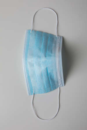 coronavirus protection blue surgical medical face masks isolatedの写真素材