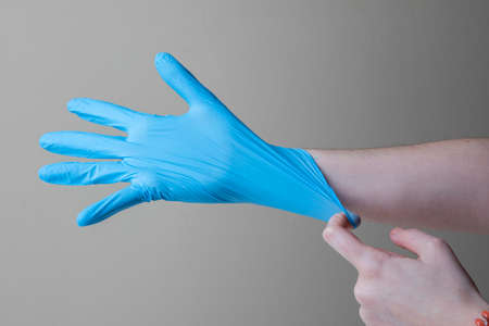 Blue medical nitrile plastic gloves texturedの写真素材