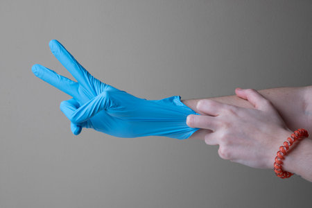 Blue medical nitrile plastic gloves texturedの写真素材