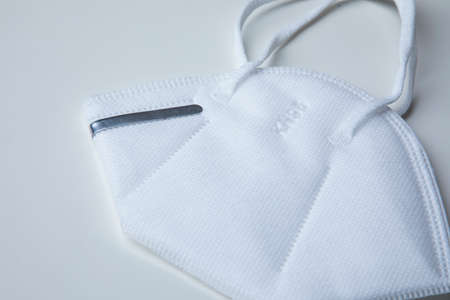 KN95 face mask protection against pm 2.5 contamination and COVID-19 coronavirus. Healthcare and medical conceptの写真素材