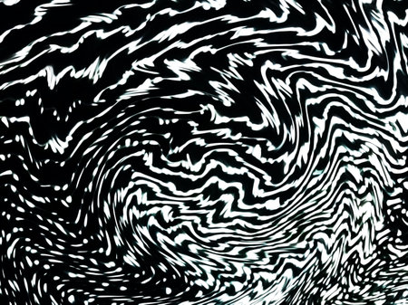 Abstract zigzag distortion of lights in a night sky, beautiful contrast between black and white.