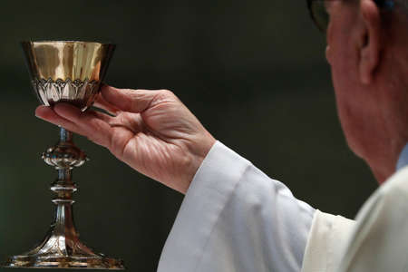 The Visitation Monastery. Catholic mass. Eucharist celebration. Close-up. Marclaz. France. 03/22/2018のeditorial素材