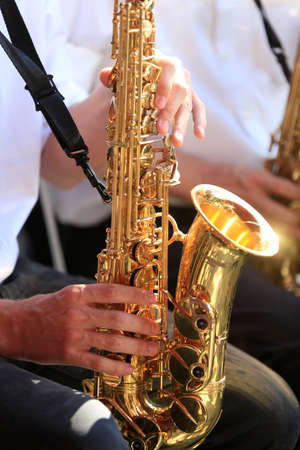 Faucigny music festival. Brass band musicians. Saxophone. Saint-Gervais. France.の写真素材