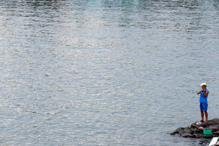 Man fishing on the sea. Phu Quoc. Vietnam.の写真素材