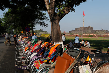 Tradional vietnamese cylos on street waiting for customer in front the imperial city. Hue. Vietnam.の写真素材