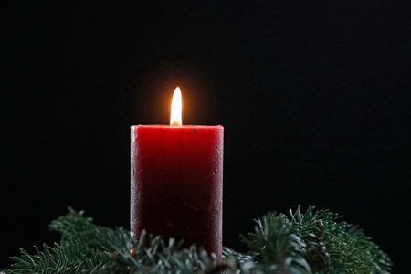 Red advent candle. Christmas composition. France.の写真素材