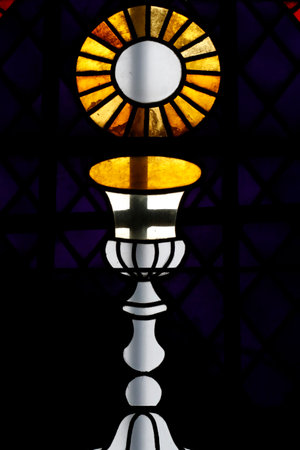 Stained glass window. The Sacrament of the Eucharist. The Layau. France.の写真素材