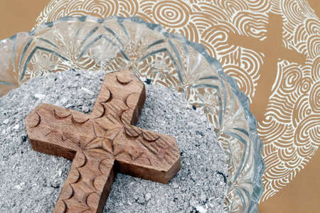 Ashes, cross and bible. Ash Wednesday. Slow season. Catholic church. France.の写真素材